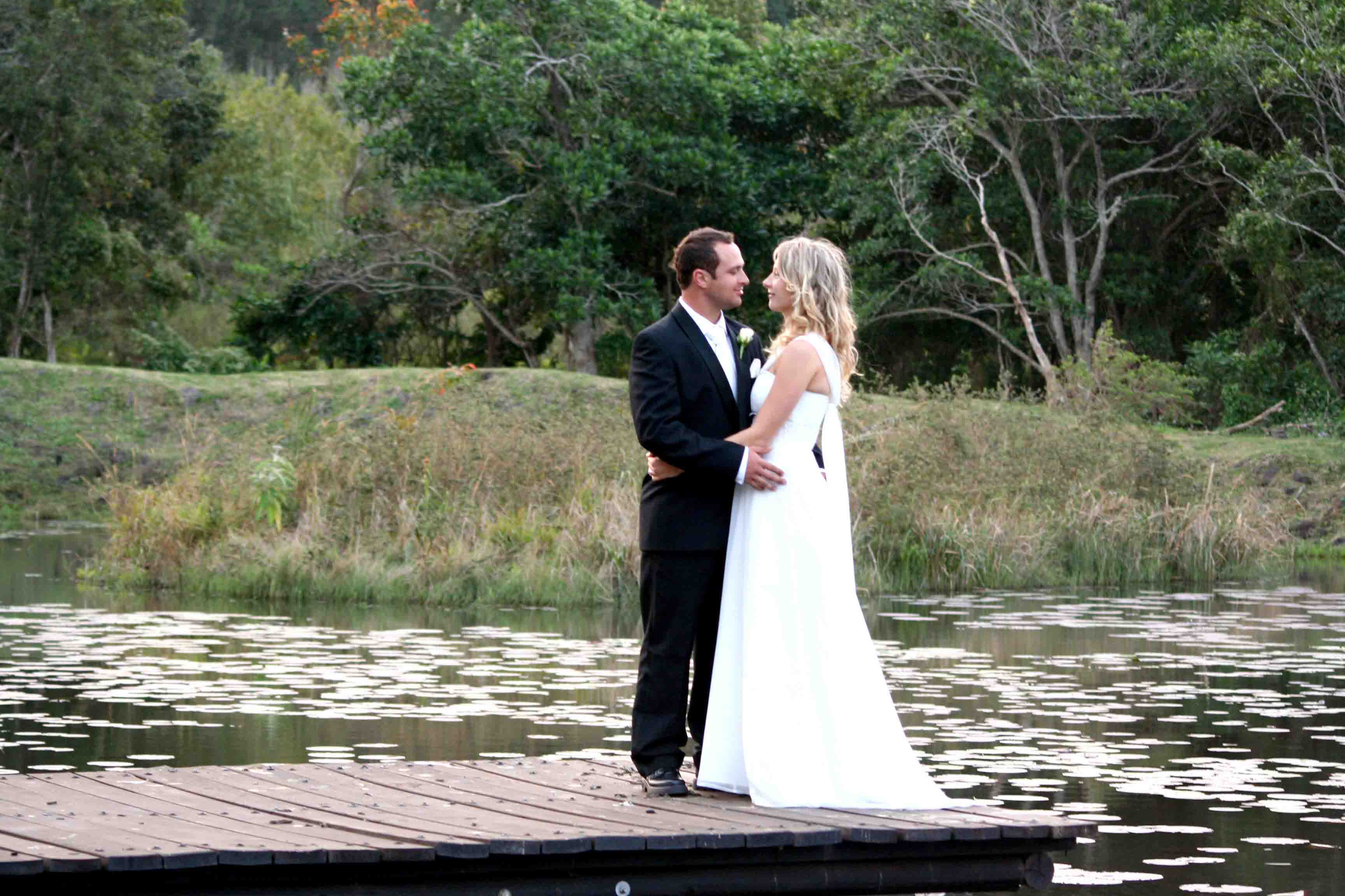 Dawie and Debbie at Beaver Creek Coffee, posing on the dock over the pond