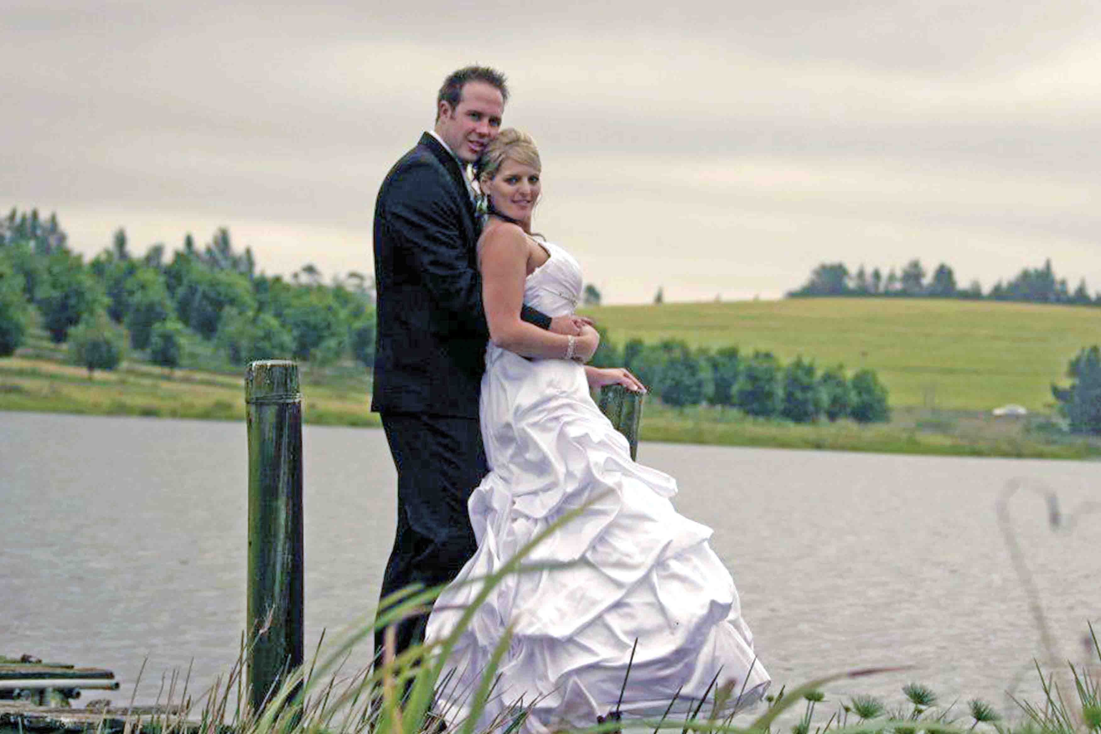 Jono and Chantal on a dock, landscape